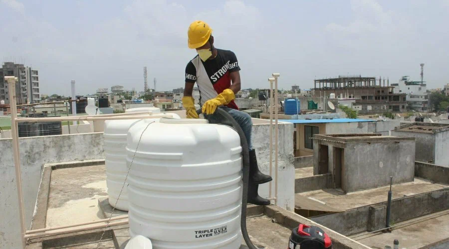 Home water tank cleaning